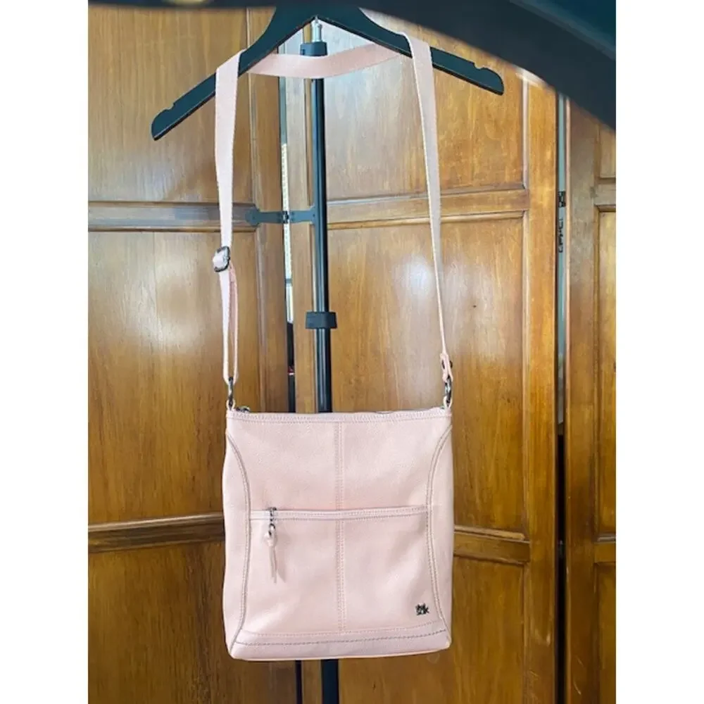 The Sak Pink Pebbled Leather Crossbody Bag Adjustable Strap Multi Pocket Purse